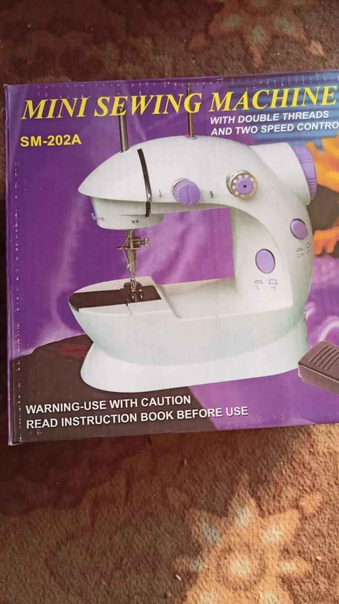 SM-202A Electric Mini Sewing Machine – Double Threads & Two Speed Control for Home & Travel